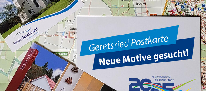 Geretsried Postkarten liegen auf einem Geretsrieder Stadtplan | © Stadt Geretsried