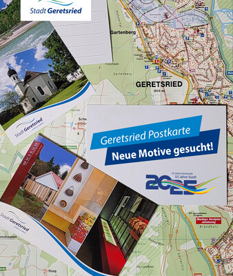 Geretsried Postkarten liegen auf einem Geretsrieder Stadtplan | © Stadt Geretsried